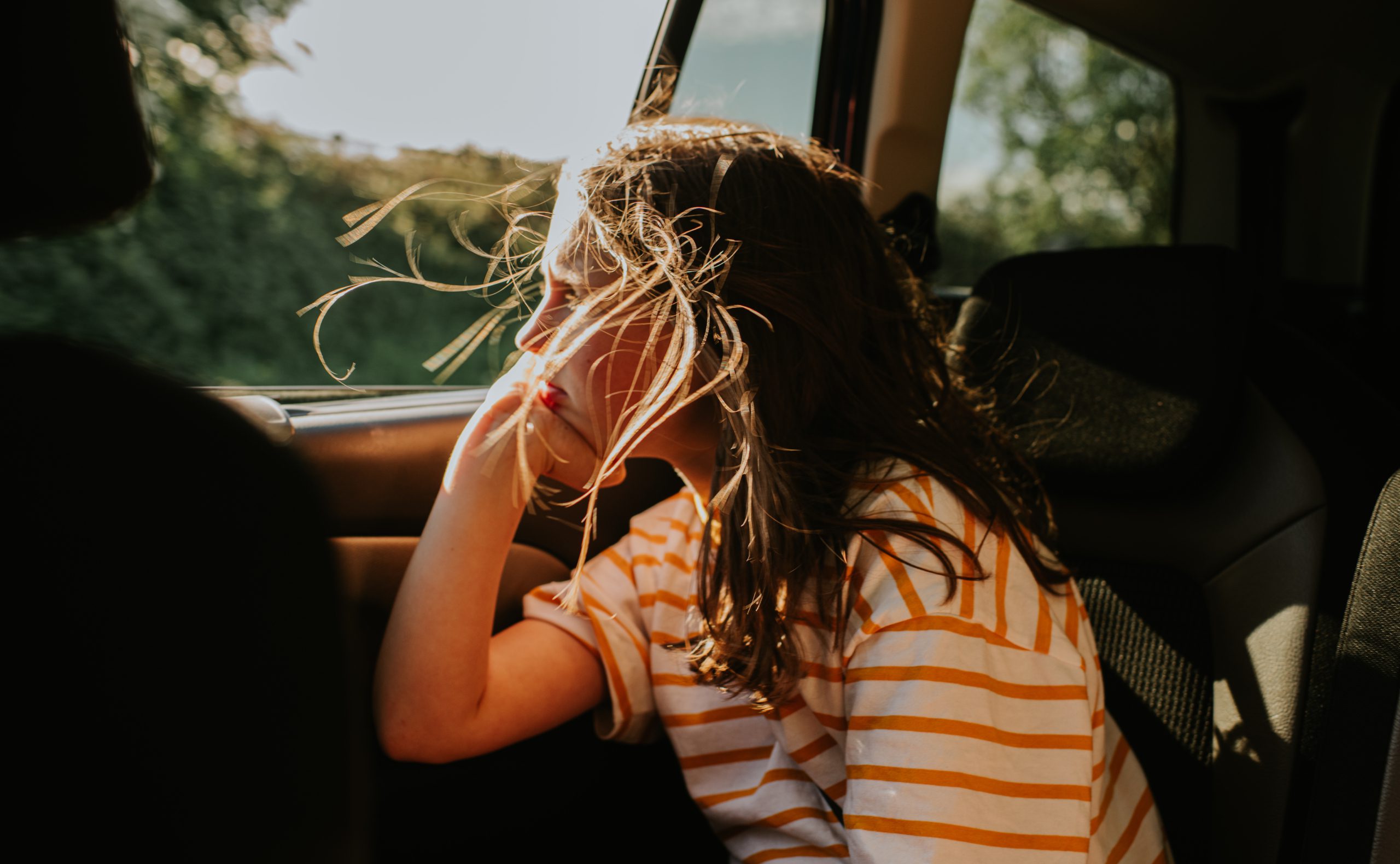 Child looking out the window.